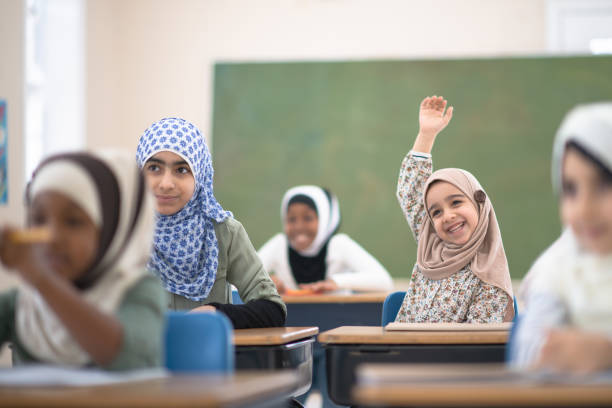 children smiling in class